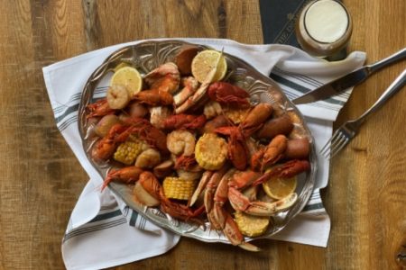 The Dearborn Brings Crawfish Boil & Happy Hour to the Loop